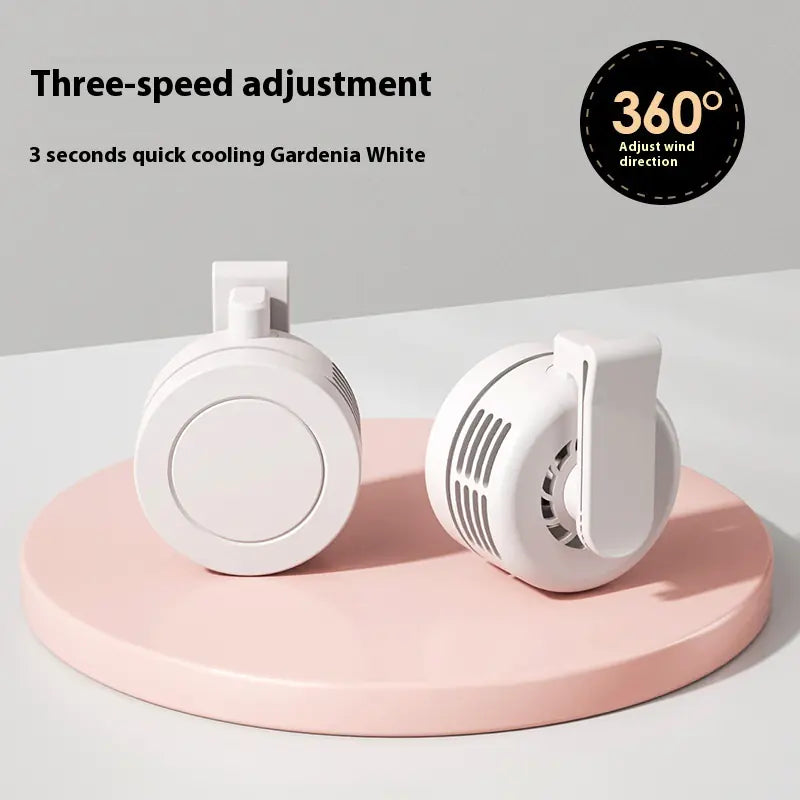 White portable fan on a pink stand with text about three-speed adjustment and quick cooling.